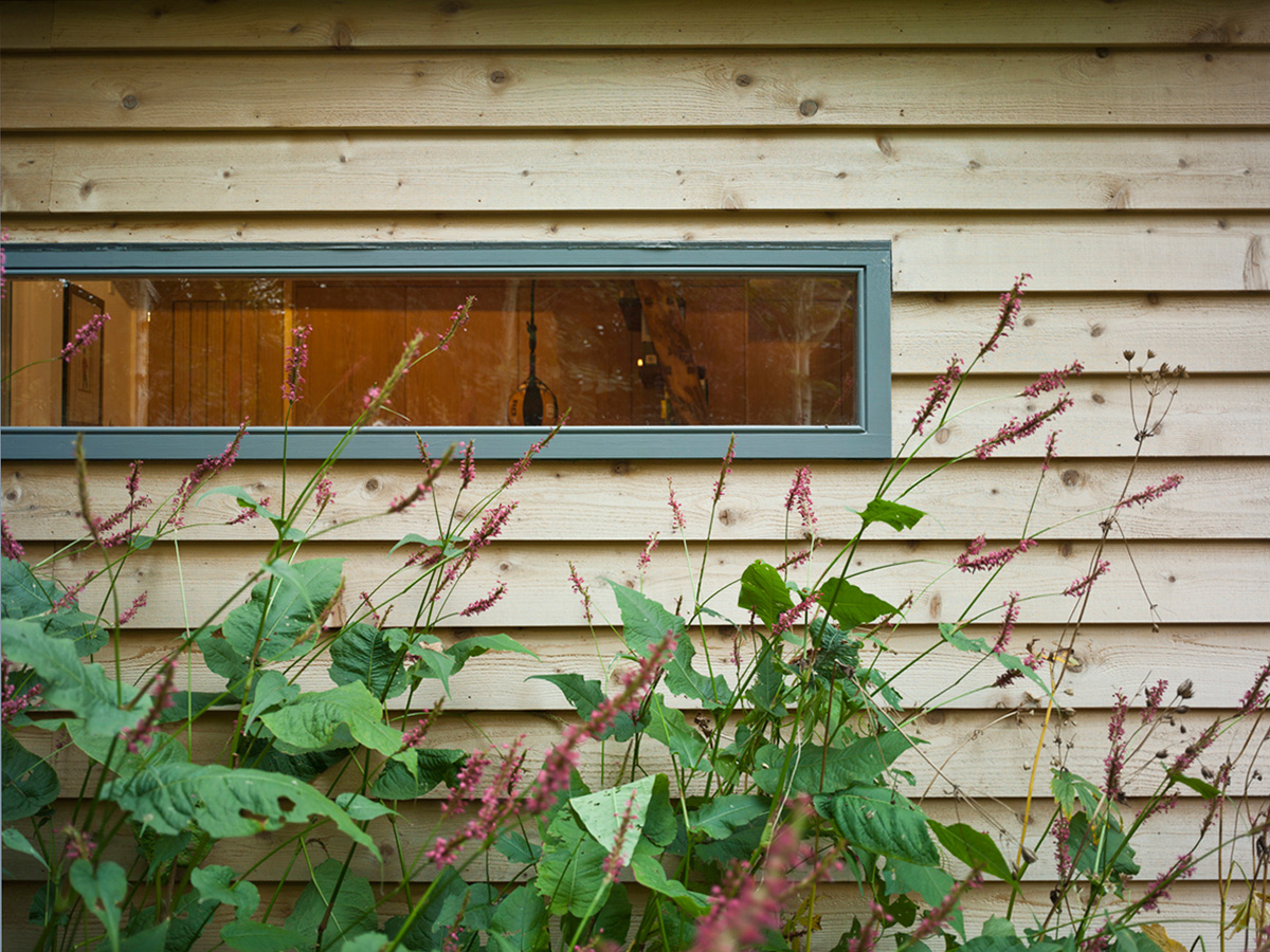 slit window / larchwood cladding detail