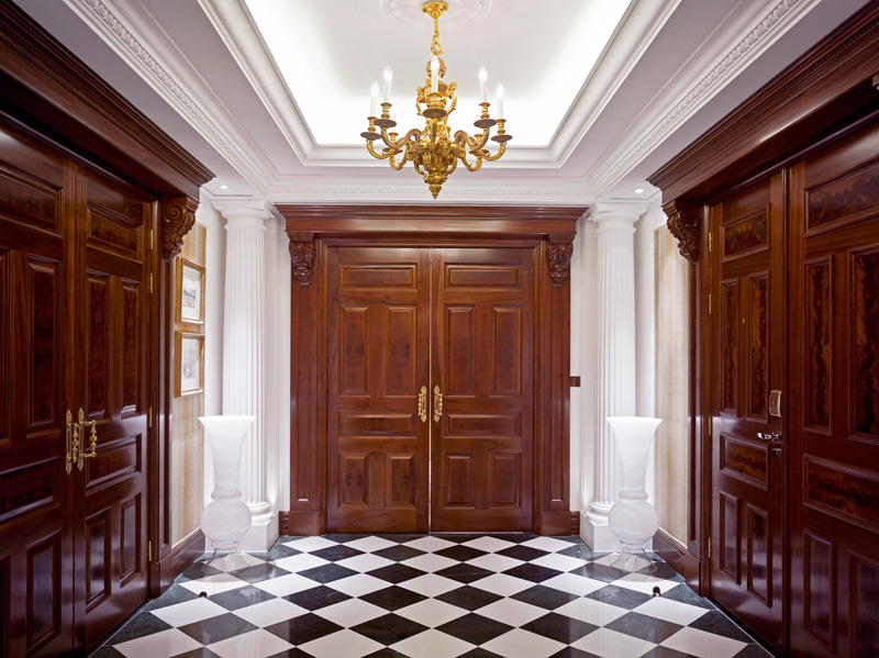 The Savoy, Royal Suite Entrance lobbywith chequered floor tiles with mahogany timber doots and specialist plaster work